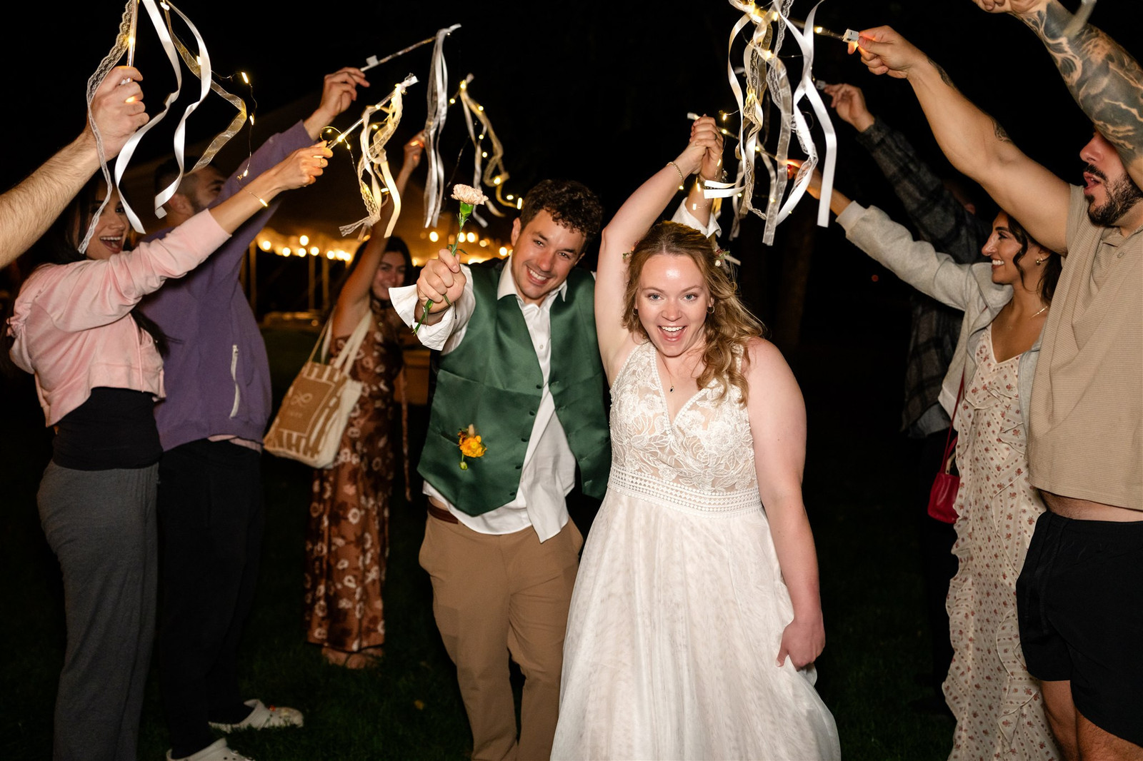 Bride and groom celebrate with sparklers at their Grottoes, VA wedding.